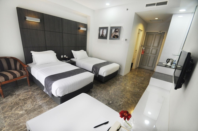Imagen de la habitación del Hotel Dreamtel Jakarta. Foto 10