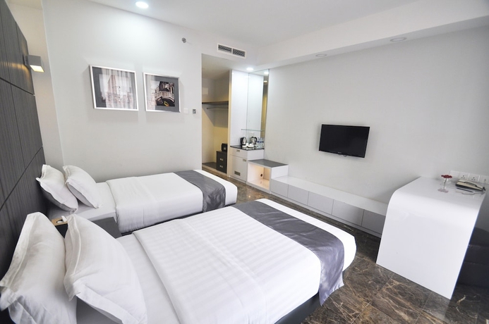 Imagen de la habitación del Hotel Dreamtel Jakarta. Foto 11