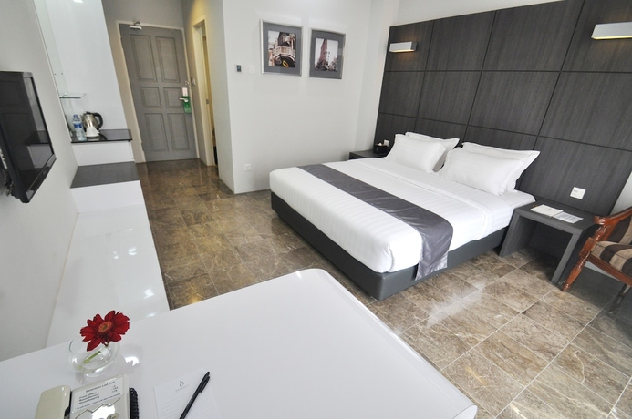 Imagen de la habitación del Hotel Dreamtel Jakarta. Foto 12