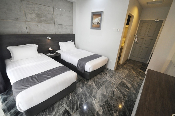 Imagen de la habitación del Hotel Dreamtel Jakarta. Foto 14