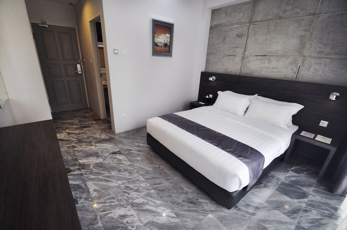 Imagen de la habitación del Hotel Dreamtel Jakarta. Foto 17