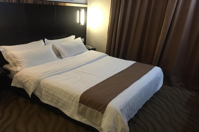 Imagen de la habitación del Hotel Dreamtel Kota Kinabalu. Foto 3