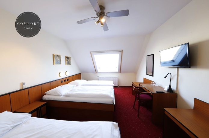 Imagen de la habitación del Hotel Drei Kronen Vienna City. Foto 4