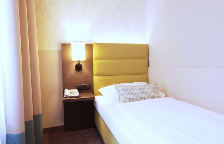 Imagen de la habitación del Hotel Drei Kronen Vienna City. Foto 7