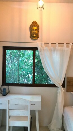 Imagen de la habitación del Hotel Driftwood Glamping and Boutique. Foto 23