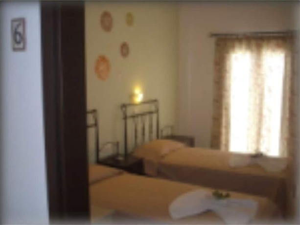 Imagen de la habitación del Hotel Drimoni Boutique. Foto 9