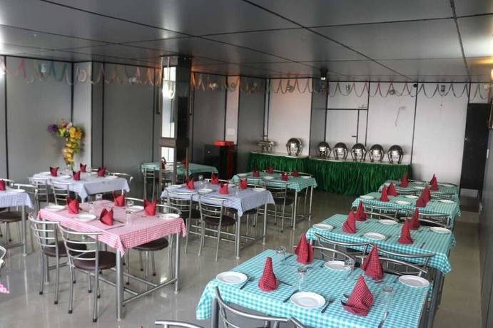 Imagen del bar/restaurante del Hotel Drive Inn, Library Bazaar. Foto 9