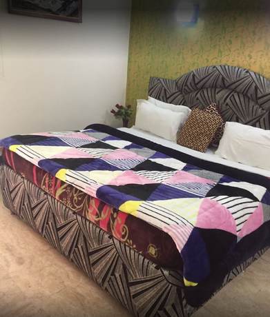Imagen de la habitación del Hotel Drive Inn, Library Bazaar. Foto 14