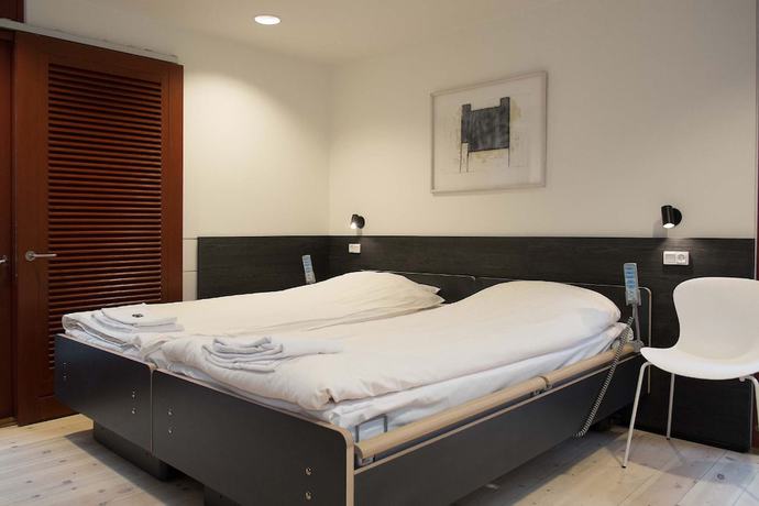 Imagen de la habitación del Hotel Dronningens Ferieby. Foto 16
