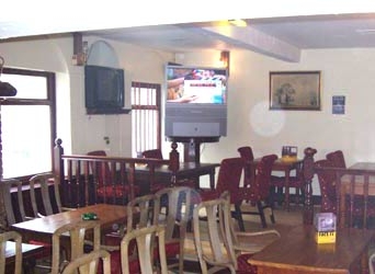 Imagen del bar/restaurante del Hotel Drop Inn. Foto 2