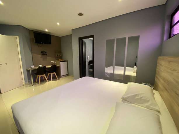 Imagen de la habitación del Hotel Drops Motel Campinas. Foto 16