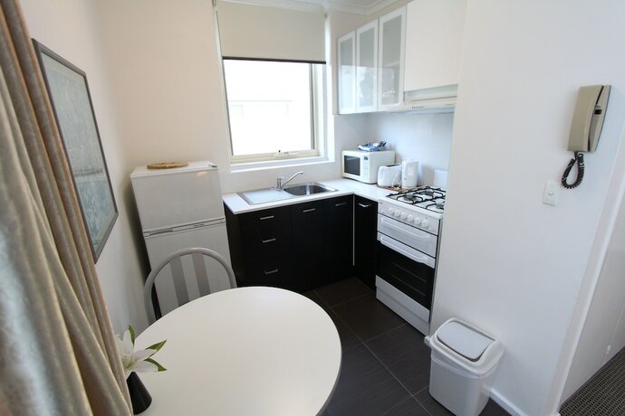 Imagen de la habitación del Hotel Drummond Apartments Services. Foto 18