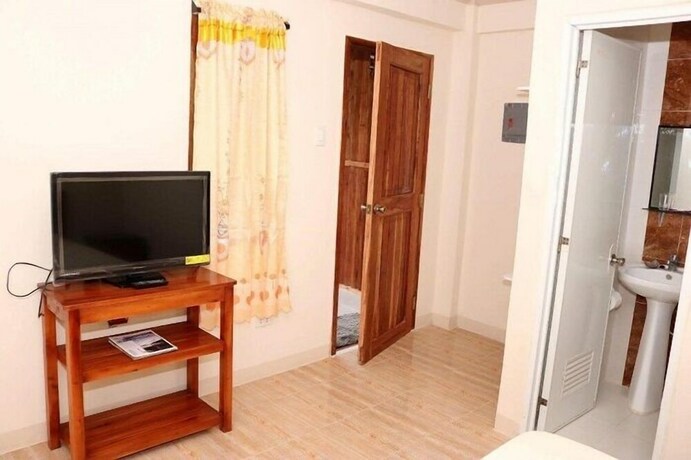 Imagen de la habitación del Hotel D's Ocean View Beach Resort. Foto 27
