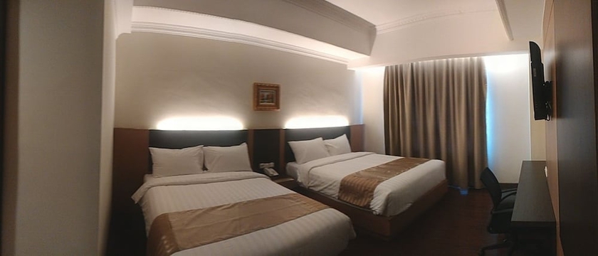 Imagen de la habitación del Hotel D'senopati Malioboro Grand. Foto 4