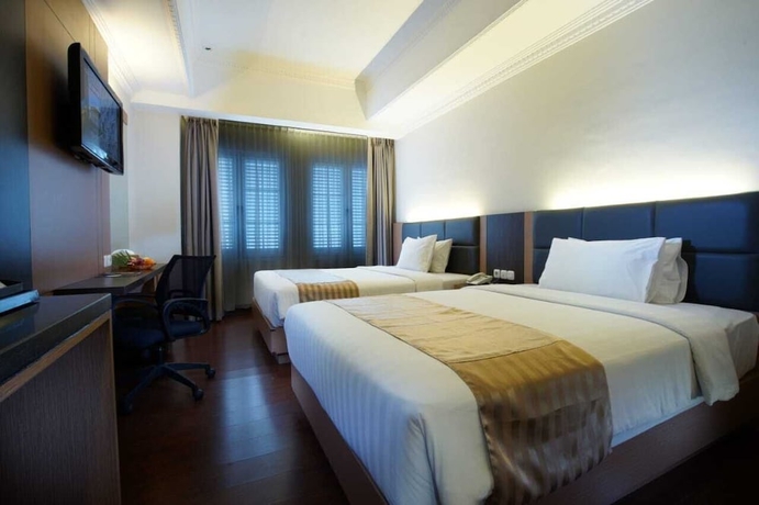 Imagen de la habitación del Hotel D'senopati Malioboro Grand. Foto 5