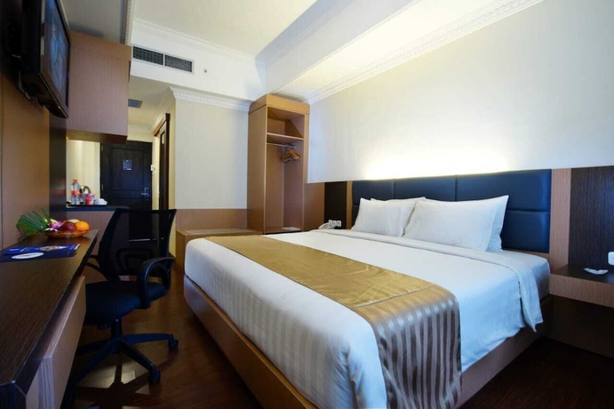 Imagen de la habitación del Hotel D'senopati Malioboro Grand. Foto 8