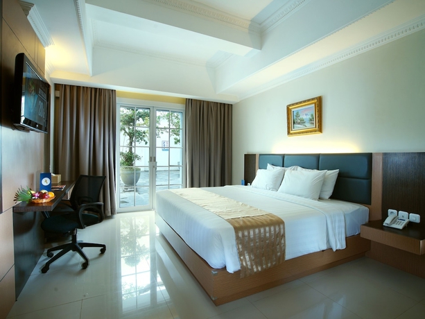 Imagen de la habitación del Hotel D'senopati Malioboro Grand. Foto 12