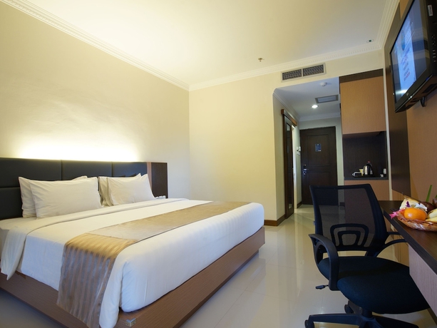 Imagen de la habitación del Hotel D'senopati Malioboro Grand. Foto 13