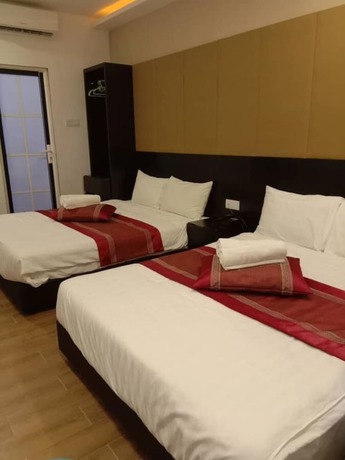 Imagen de la habitación del Hotel D'spark Bayu Tinggi. Foto 4