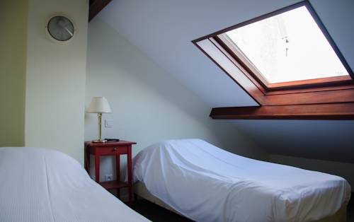 Imagen de la habitación del Hotel Du Centre. Foto 7