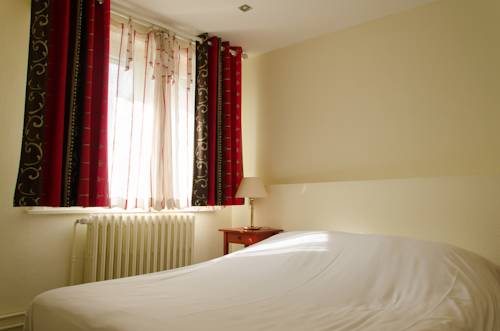 Imagen de la habitación del Hotel Du Centre. Foto 10