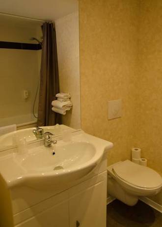 Imagen de la habitación del Hotel Du Centre. Foto 16