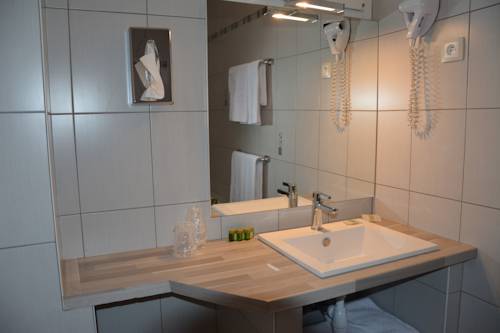 Imagen de la habitación del Hotel Du Centre, Molsheim. Foto 16