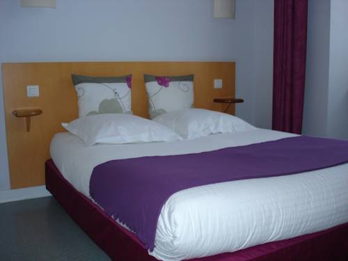 Imagen de la habitación del Hotel Du Cheval Blanc. Foto 7