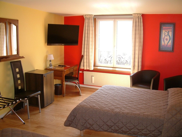 Imagen de la habitación del Hotel Du Cheval De Bronze. Foto 8