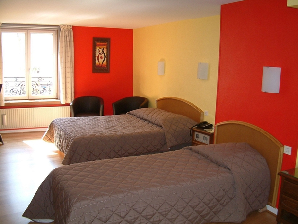 Imagen de la habitación del Hotel Du Cheval De Bronze. Foto 13