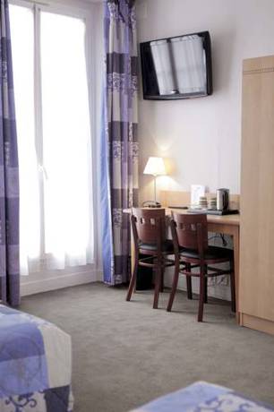 Imagen de la habitación del Hotel Du Cheval Rouge. Foto 4