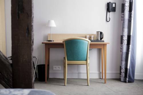 Imagen de la habitación del Hotel Du Cheval Rouge. Foto 15