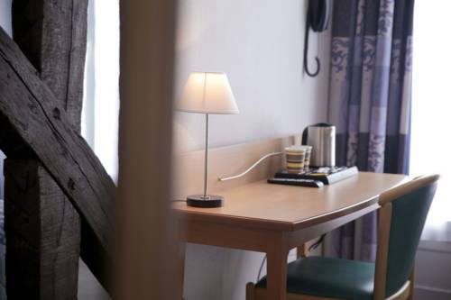 Imagen de la habitación del Hotel Du Cheval Rouge. Foto 16