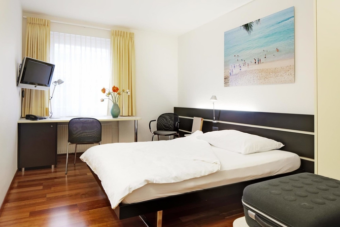 Imagen de la habitación del Hotel Du Commerce, Basilea. Foto 3