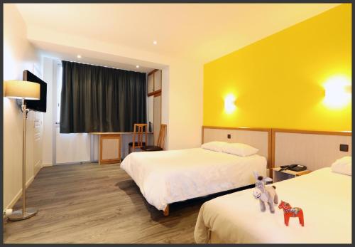 Imagen de la habitación del Hotel Du Commerce Spa. Foto 5