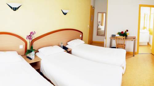 Imagen de la habitación del Hotel Du Commerce, Volvic. Foto 5