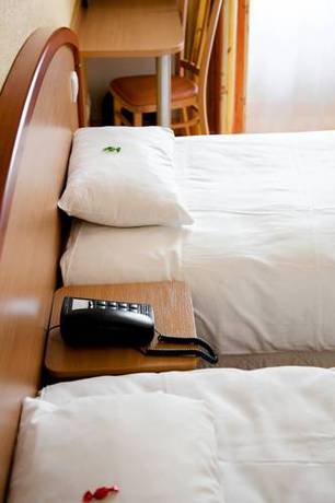 Imagen de la habitación del Hotel Du Commerce, Volvic. Foto 6