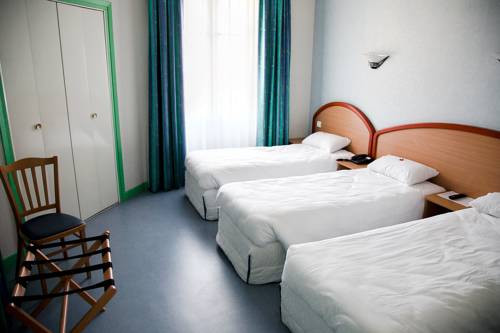 Imagen de la habitación del Hotel Du Commerce, Volvic. Foto 12