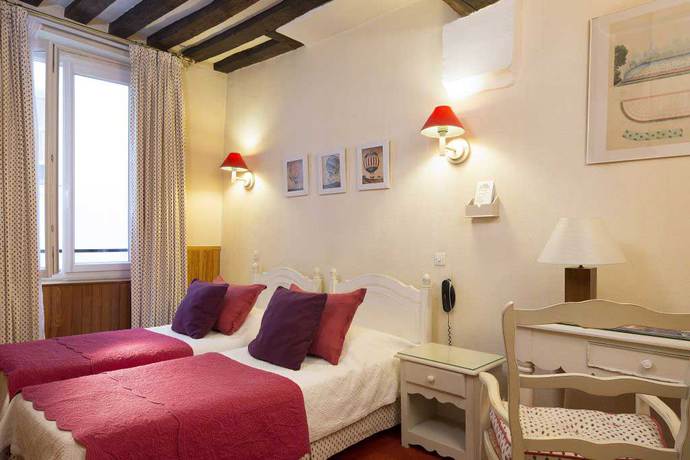 Imagen de la habitación del Hotel Du Cygne Paris. Foto 5