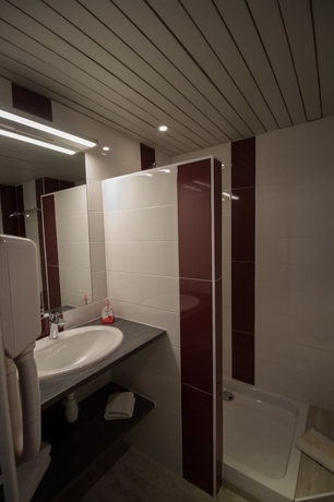 Imagen de la habitación del Hotel Du Forum. Foto 13