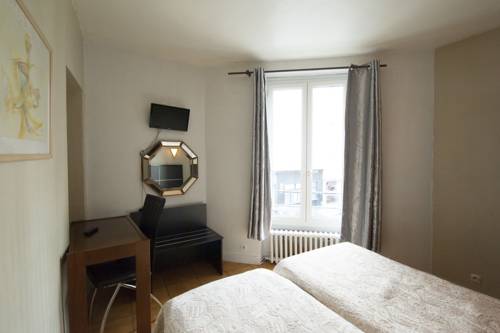 Imagen de la habitación del Hotel Du Globe 18. Foto 4