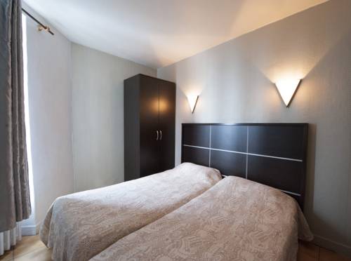 Imagen de la habitación del Hotel Du Globe 18. Foto 6