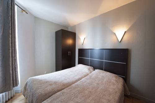 Imagen de la habitación del Hotel Du Globe 18. Foto 9