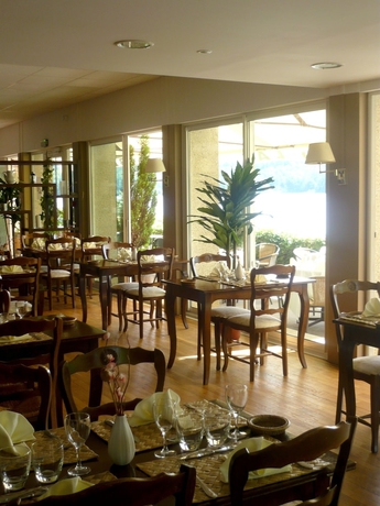 Imagen del bar/restaurante del Hotel Du Lac, Neuvic. Foto 7