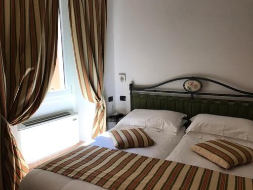 Imagen de la habitación del Hotel Du Lac Varenna. Foto 9