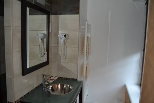 Imagen de la habitación del Hotel Du Lion Vert. Foto 8