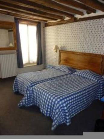 Imagen de la habitación del Hotel Du Lys. Foto 16