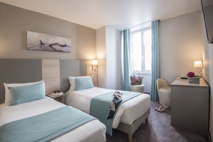 Imagen de la habitación del Hotel Du Midi, Niza. Foto 2