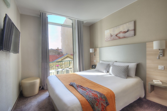 Imagen de la habitación del Hotel Du Midi, Niza. Foto 4