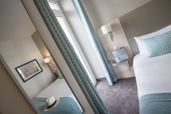 Imagen de la habitación del Hotel Du Midi, Niza. Foto 12